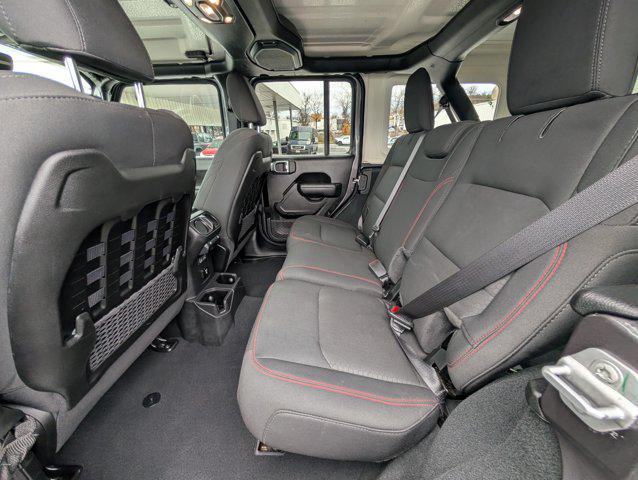 used 2022 Jeep Wrangler Unlimited car, priced at $38,892