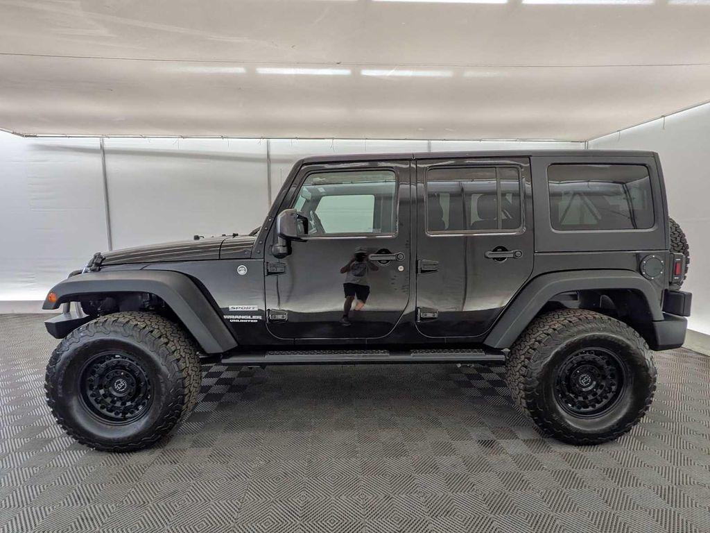 used 2015 Jeep Wrangler Unlimited car, priced at $16,995