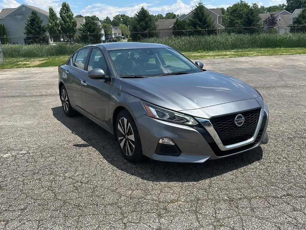used 2022 Nissan Altima car, priced at $20,000