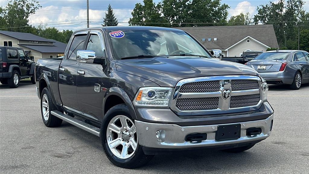 used 2015 Ram 1500 car, priced at $19,375