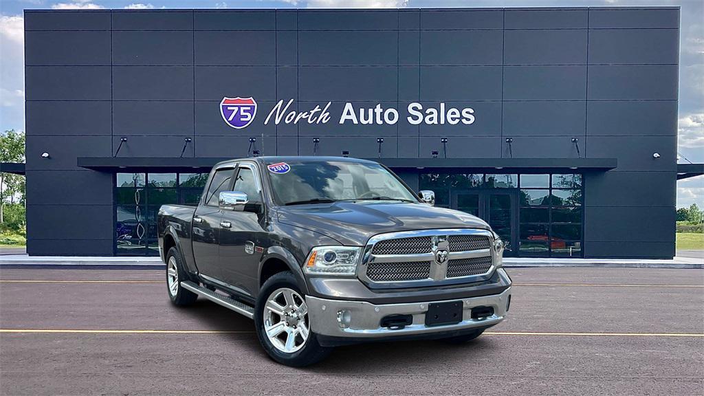 used 2015 Ram 1500 car, priced at $19,375