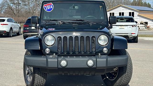 used 2014 Jeep Wrangler Unlimited car, priced at $17,575