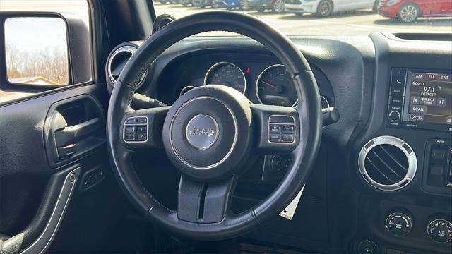used 2014 Jeep Wrangler Unlimited car, priced at $17,575
