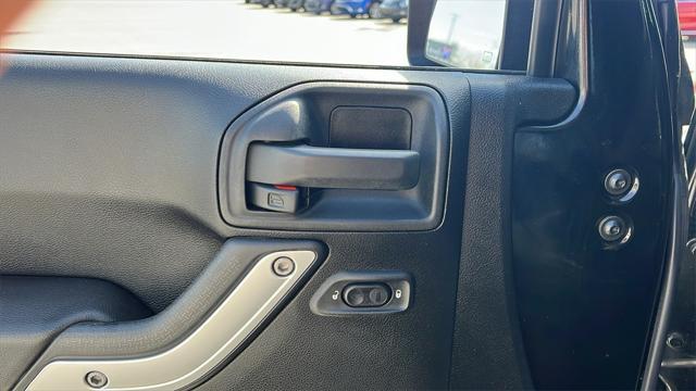 used 2014 Jeep Wrangler Unlimited car, priced at $17,575