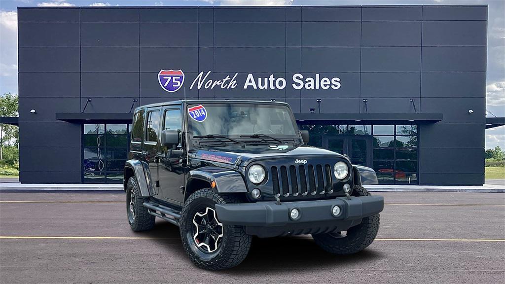 used 2014 Jeep Wrangler Unlimited car, priced at $16,375