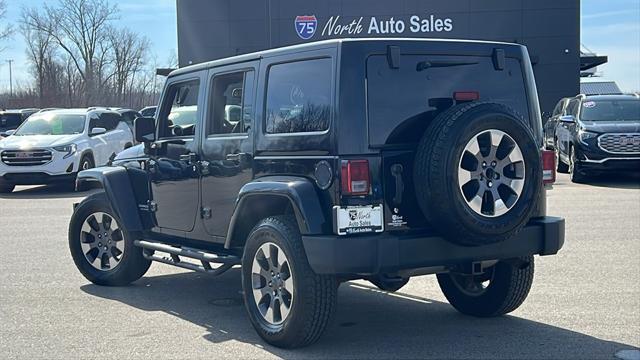used 2014 Jeep Wrangler Unlimited car, priced at $17,575