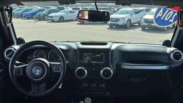 used 2014 Jeep Wrangler Unlimited car, priced at $17,575