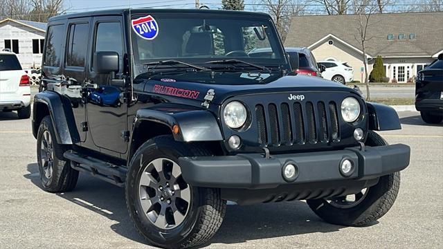 used 2014 Jeep Wrangler Unlimited car, priced at $17,575