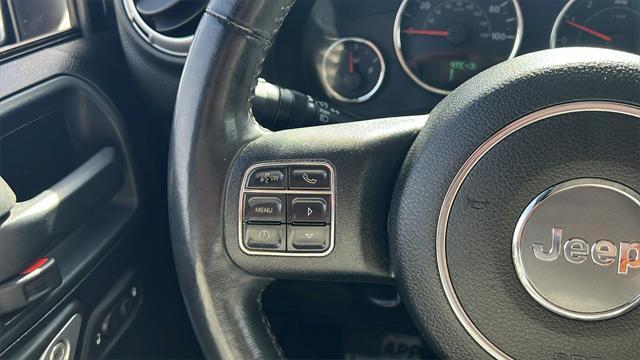 used 2014 Jeep Wrangler Unlimited car, priced at $17,575