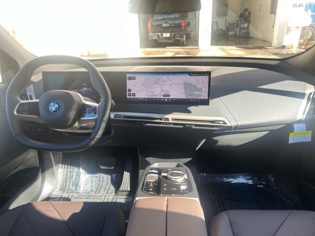 new 2024 BMW iX car, priced at $97,755