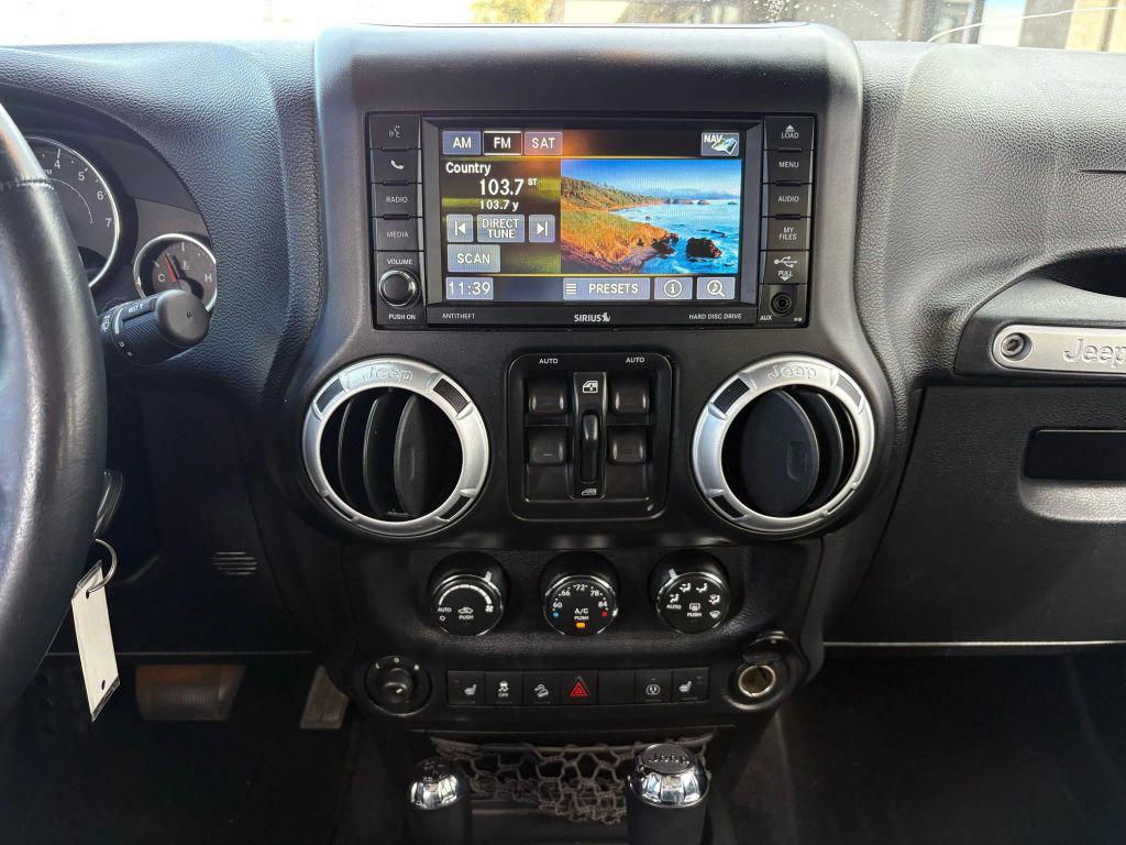 used 2014 Jeep Wrangler Unlimited car, priced at $16,995