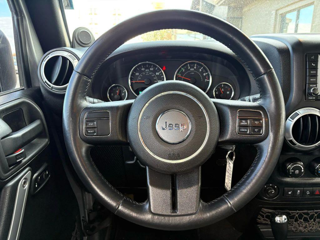 used 2014 Jeep Wrangler Unlimited car, priced at $16,995