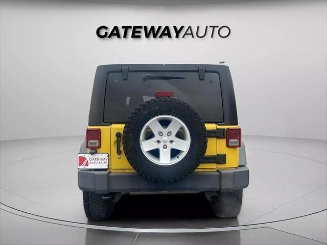 used 2011 Jeep Wrangler Unlimited car, priced at $12,995