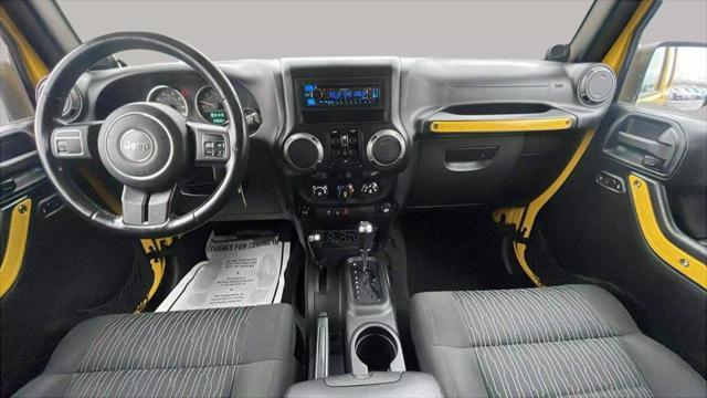 used 2011 Jeep Wrangler Unlimited car, priced at $12,995