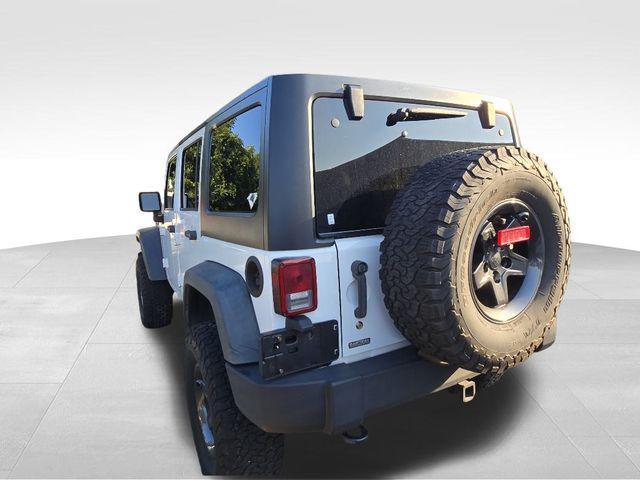used 2013 Jeep Wrangler Unlimited car, priced at $15,991