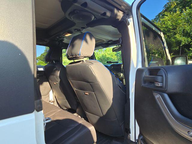 used 2013 Jeep Wrangler Unlimited car, priced at $15,991