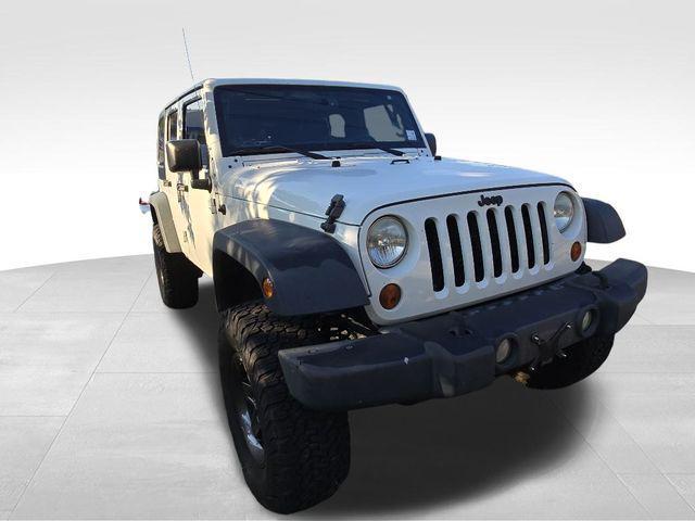 used 2013 Jeep Wrangler Unlimited car, priced at $15,991