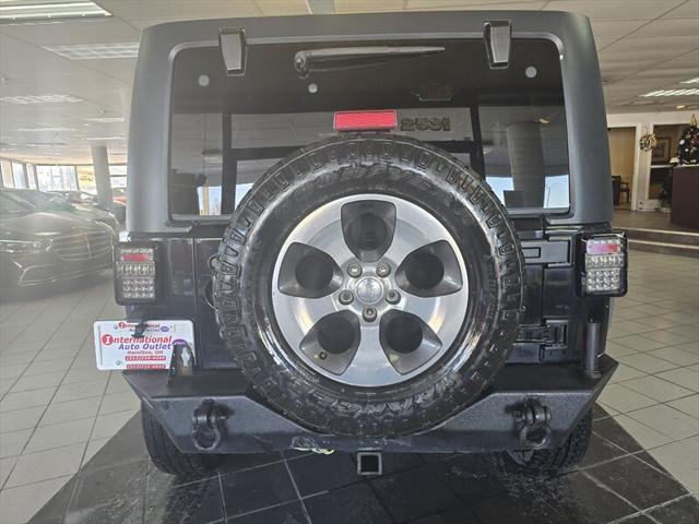 used 2013 Jeep Wrangler Unlimited car, priced at $9,995