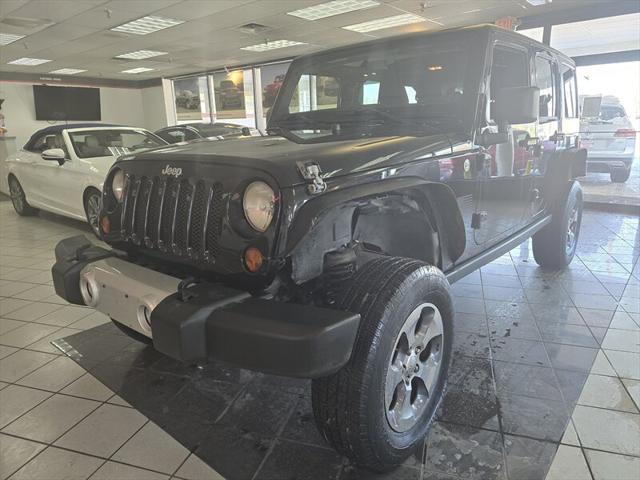 used 2013 Jeep Wrangler Unlimited car, priced at $9,995