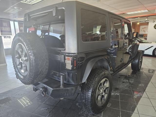 used 2013 Jeep Wrangler Unlimited car, priced at $9,995