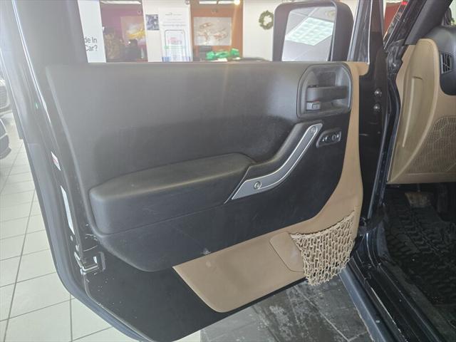 used 2013 Jeep Wrangler Unlimited car, priced at $9,995