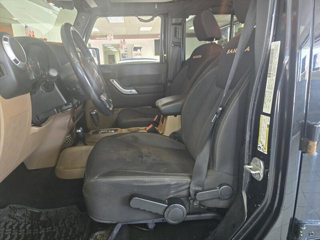 used 2013 Jeep Wrangler Unlimited car, priced at $9,995