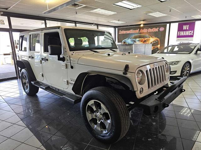 used 2016 Jeep Wrangler Unlimited car, priced at $14,995