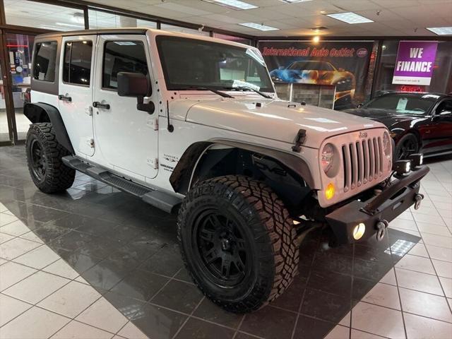 used 2016 Jeep Wrangler Unlimited car, priced at $16,495