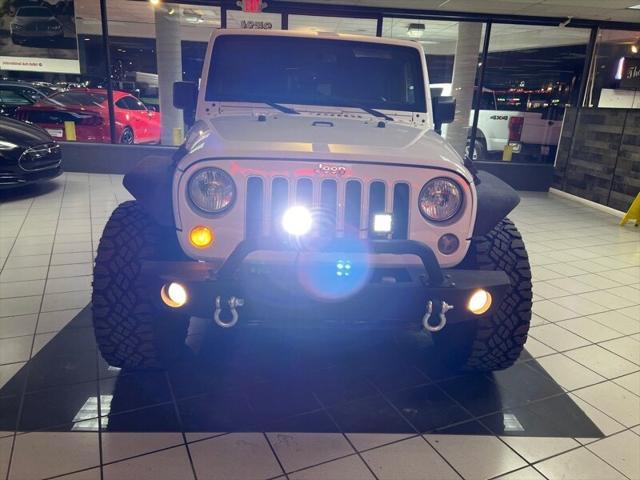 used 2016 Jeep Wrangler Unlimited car, priced at $16,495