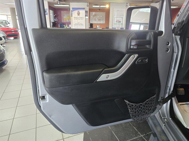 used 2014 Jeep Wrangler Unlimited car, priced at $16,995