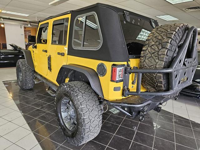 used 2015 Jeep Wrangler Unlimited car, priced at $22,995