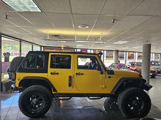 used 2015 Jeep Wrangler Unlimited car, priced at $22,995