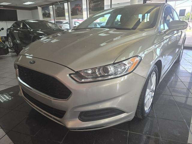 used 2016 Ford Fusion car, priced at $6,995