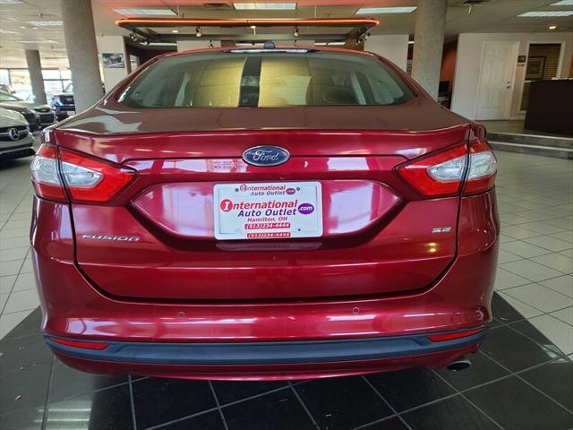 used 2014 Ford Fusion car, priced at $10,995