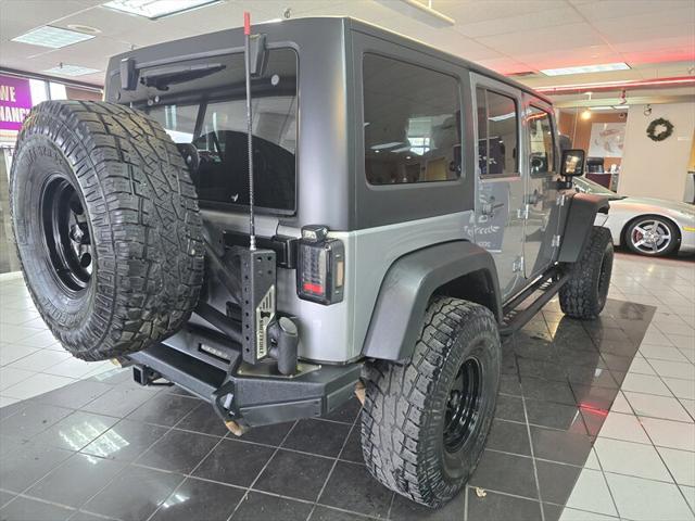 used 2015 Jeep Wrangler Unlimited car, priced at $19,995