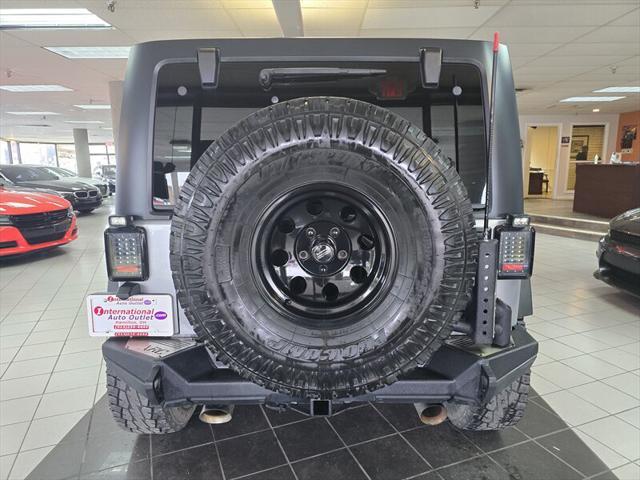 used 2015 Jeep Wrangler Unlimited car, priced at $19,995