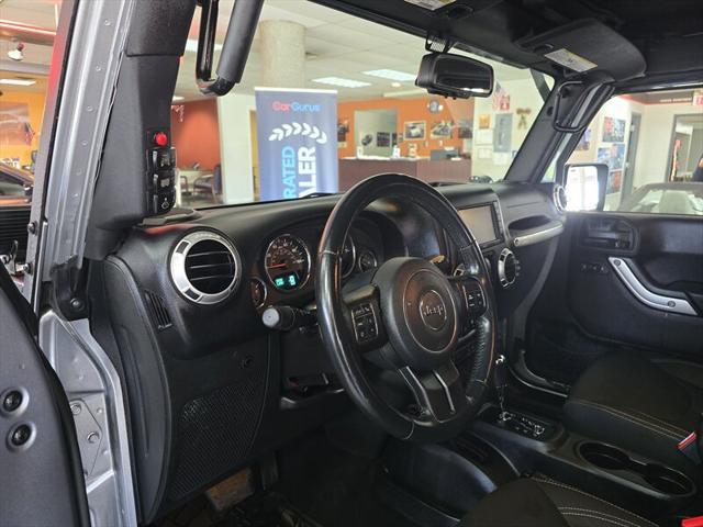 used 2015 Jeep Wrangler car, priced at $21,995