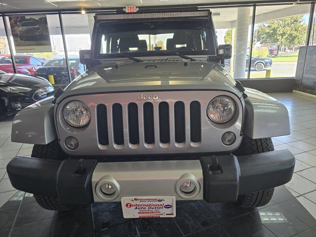 used 2015 Jeep Wrangler car, priced at $21,995