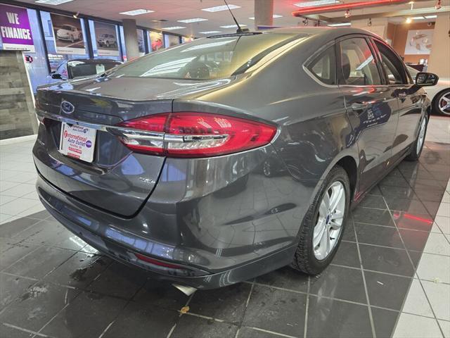 used 2018 Ford Fusion car, priced at $11,995