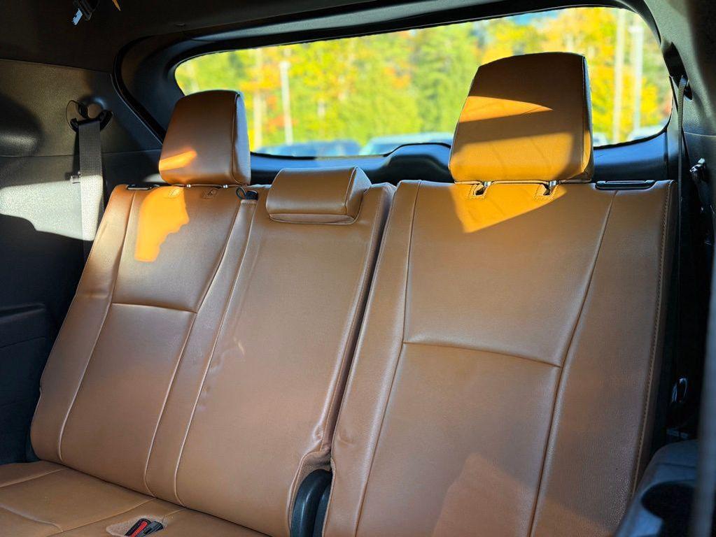 used 2024 Toyota Highlander Hybrid car, priced at $52,258