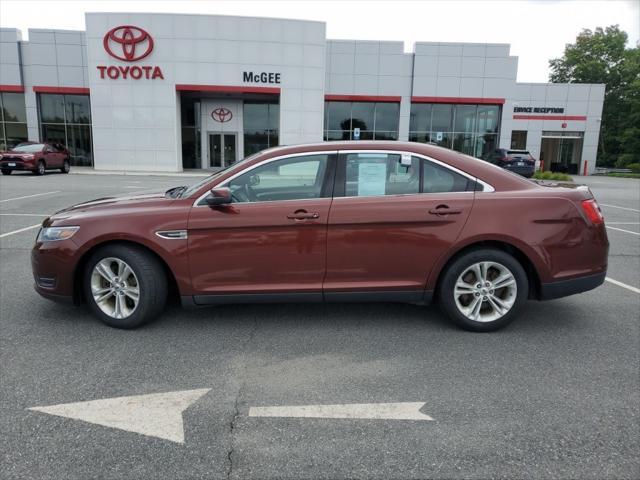 used 2015 Ford Taurus car, priced at $10,000