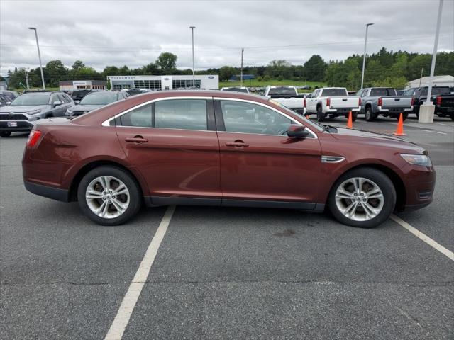 used 2015 Ford Taurus car, priced at $10,000