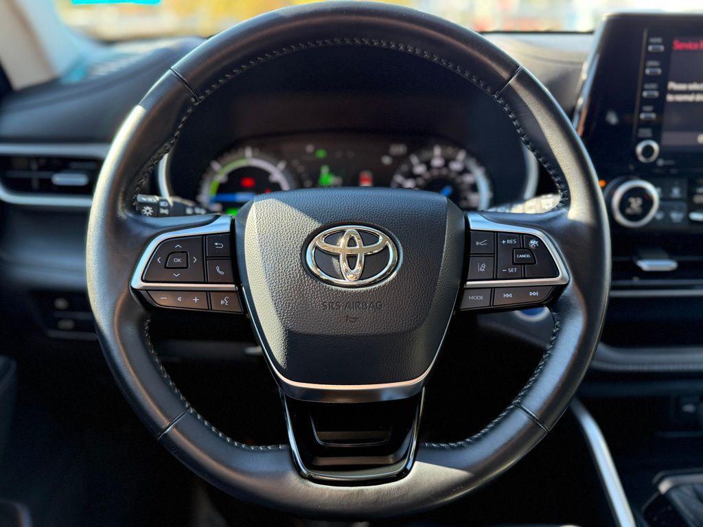 used 2021 Toyota Highlander Hybrid car, priced at $28,289