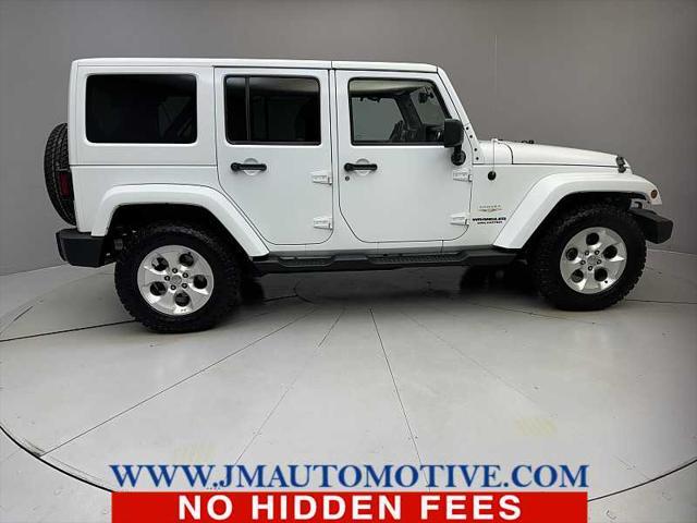 used 2013 Jeep Wrangler Unlimited car, priced at $19,995