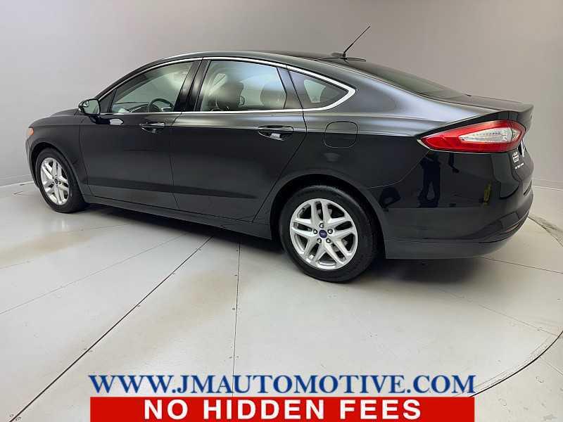 used 2014 Ford Fusion car, priced at $6,995