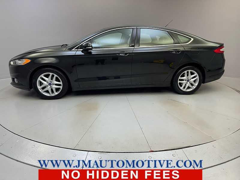 used 2014 Ford Fusion car, priced at $6,995