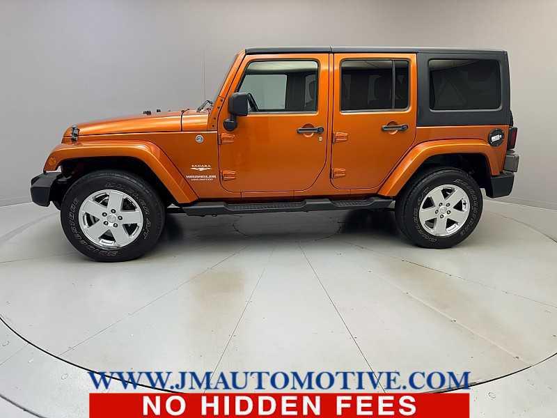 used 2011 Jeep Wrangler Unlimited car, priced at $10,995