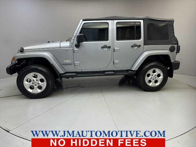 used 2014 Jeep Wrangler Unlimited car, priced at $14,995