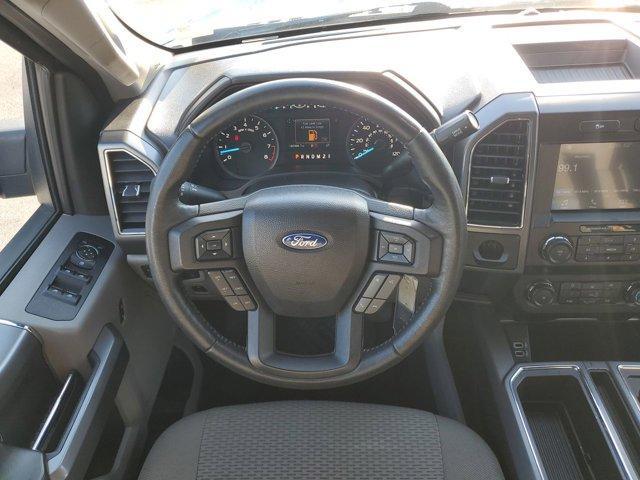 used 2019 Ford F-150 car, priced at $23,497