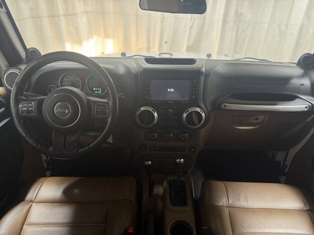 used 2011 Jeep Wrangler Unlimited car, priced at $14,988